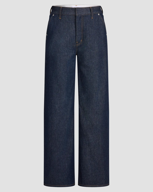 Mid-rise, wide-leg Japanese denim jeans in deep indigo rinse, slant cut pockets, zip fly finish.