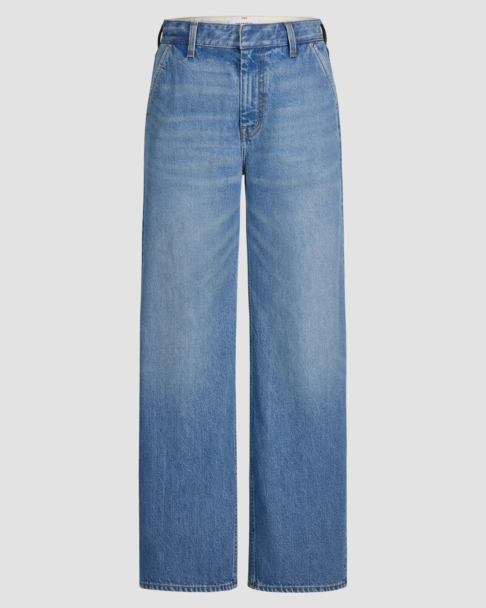 Mid-rise, wide-leg Japanese denim jean with structured silhouette, subtle thigh fading, slant cut pockets, zip fly finish.
