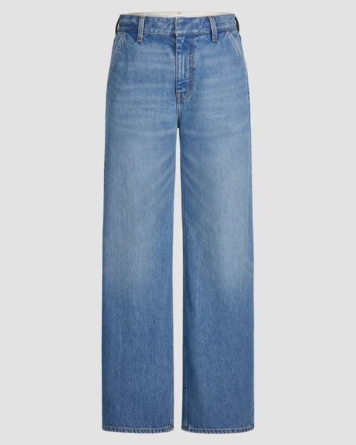 Mid-rise, wide-leg Japanese denim jean with structured silhouette, subtle thigh fading, slant cut pockets, zip fly finish.