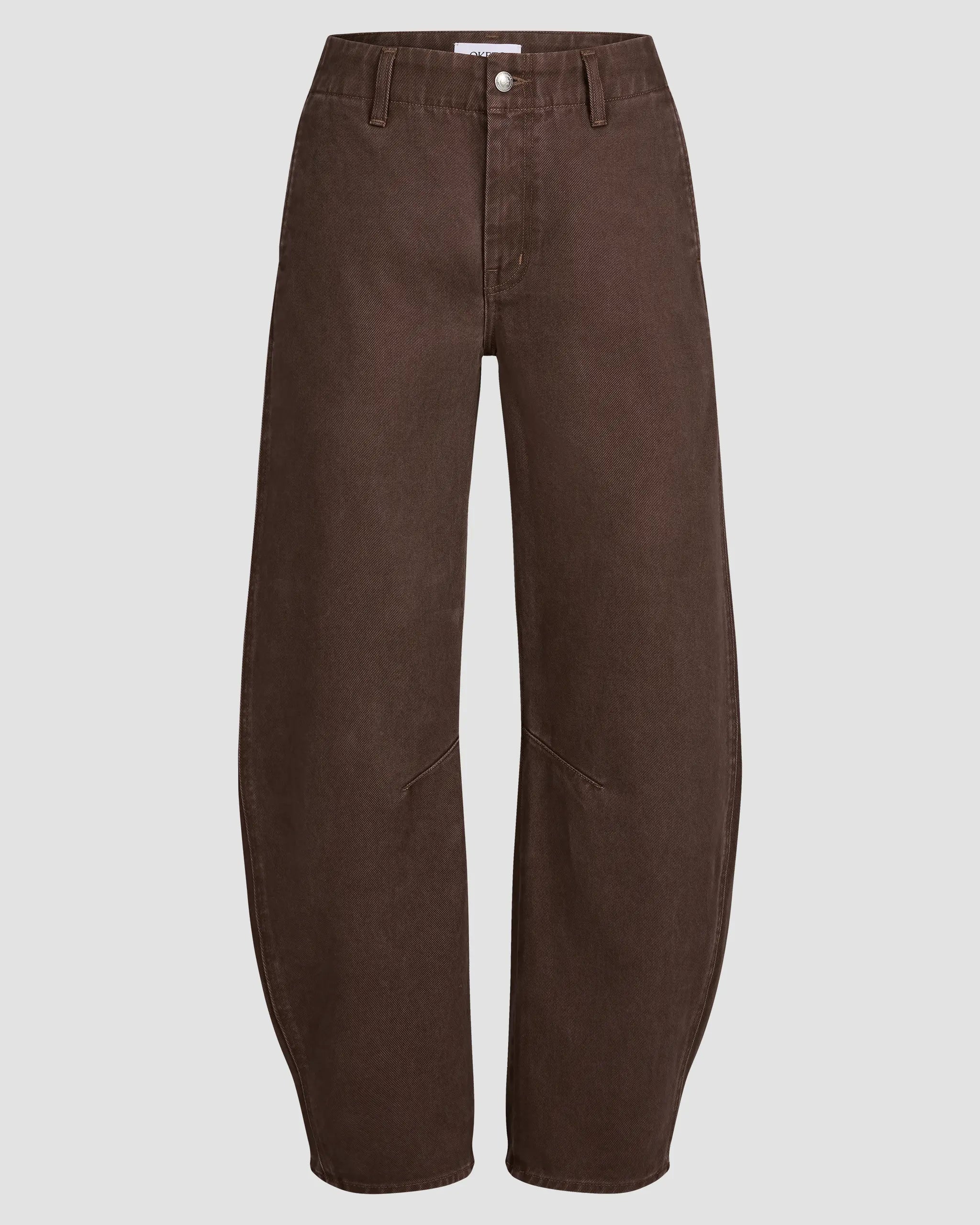 Oketo Cut 103 Barrel Jean, a Mid-rise, wide-leg barrel-cut jean in deep espresso denim with knee seam detail, front pockets. Pleated hem detail at cuff adds volume.