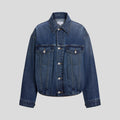 Structured jacket with oversized shoulders, pointed collar, rich indigo denim, subtle fading, silver buttons, and defined topstitching. Pleated hem detail at adds volume. Fits like an oversized bomber jacket.