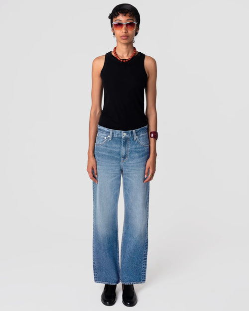 Oketo Cut 101 Straight Jean in Vintage Light; mid-rise, straight leg, light indigo wash with subtle fading; classic drape on model.